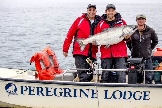 holding a big fish at peregrine lodge